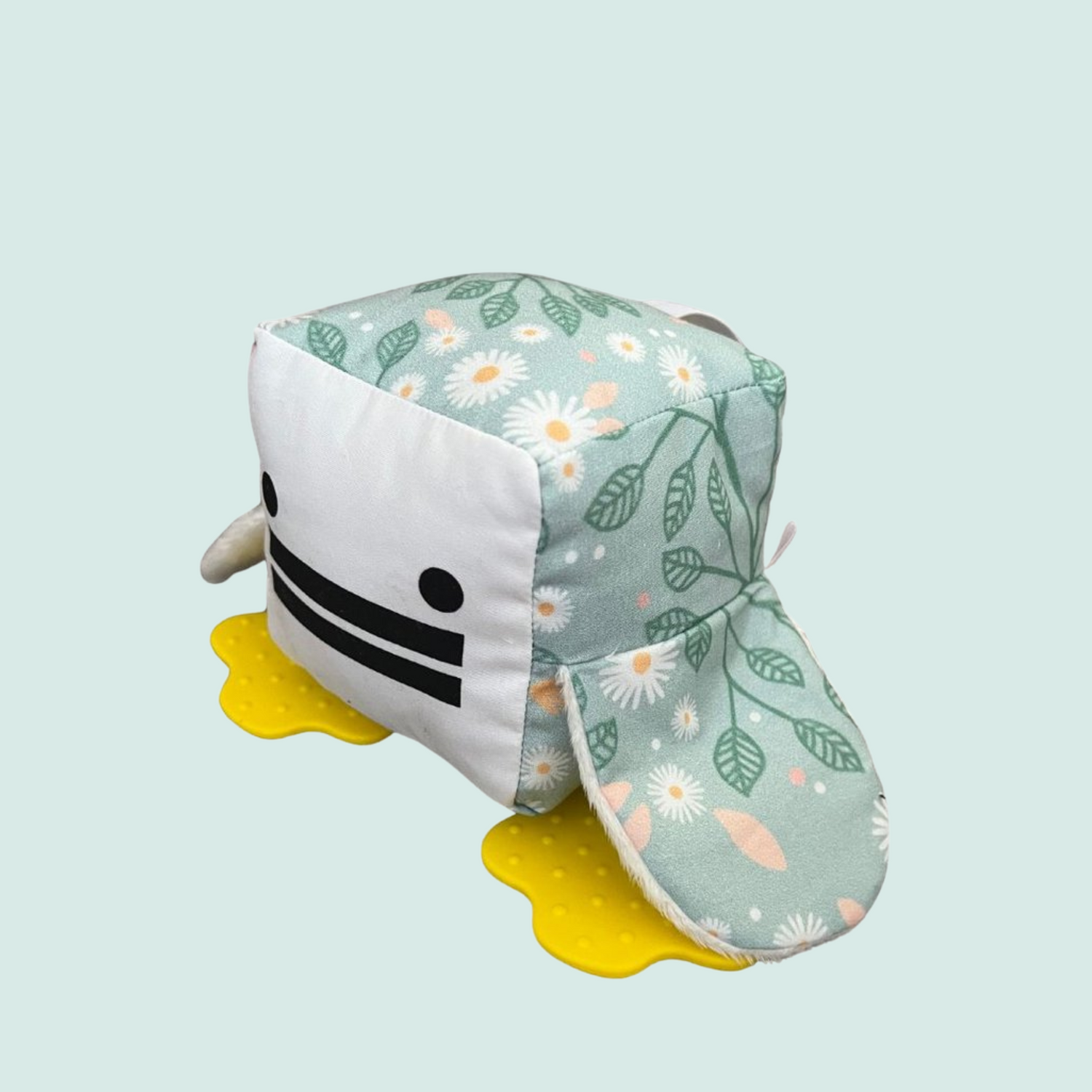 Eco-friendly and Australian-made handmade baby sensory toy — soft flower print duck with soft fabric wings and safe chewable teething feet. Montessori-inspired toy for babies to encourage sensory development, teething relief, and independent play. Perfect unique baby shower gift for new parents.