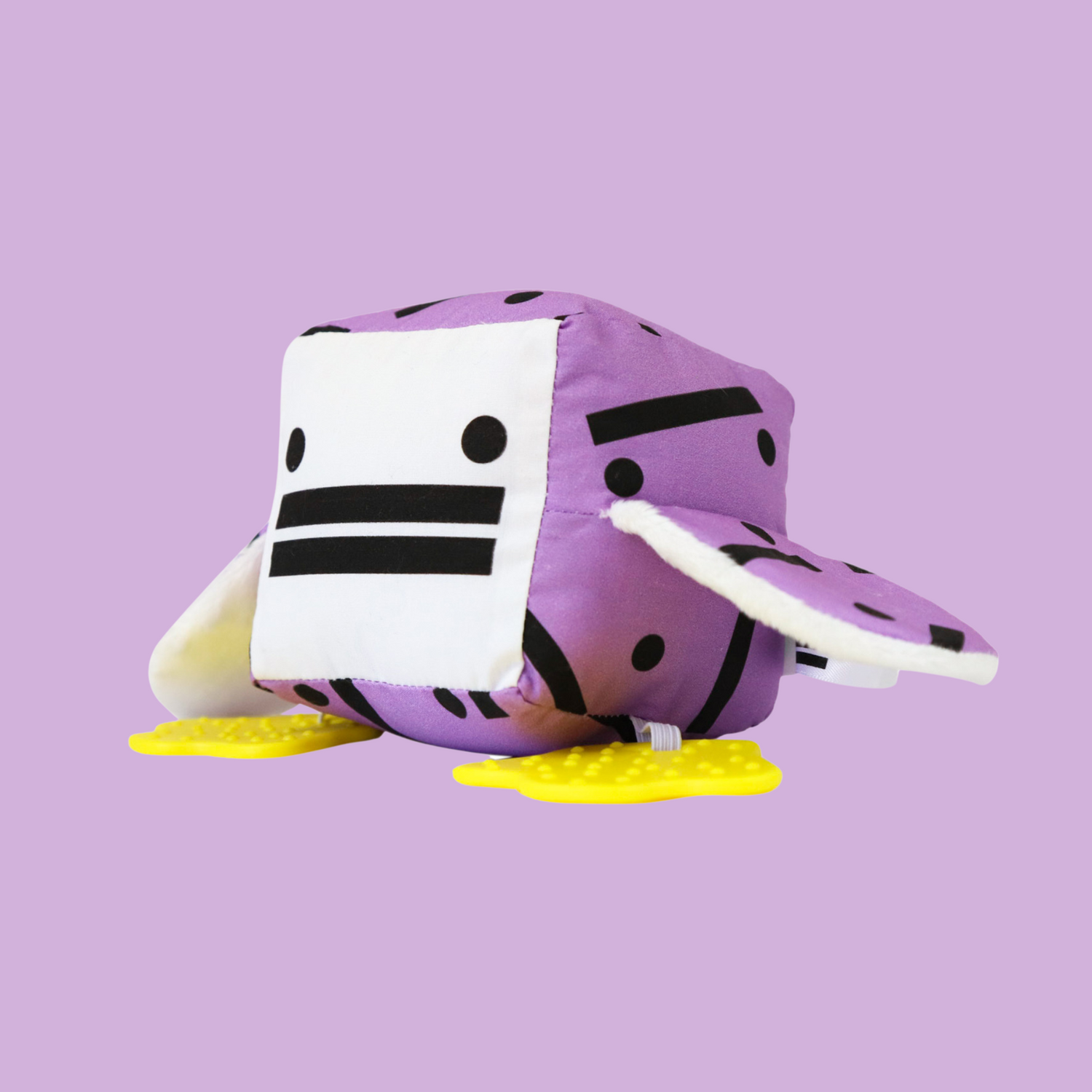 Eco-friendly and Australian-made handmade baby sensory toy — purple patterned duck with soft fabric wings and safe chewable teething feet. Montessori-inspired toy for babies to encourage sensory development, teething relief, and independent play. Perfect unique baby shower gift for new parents.