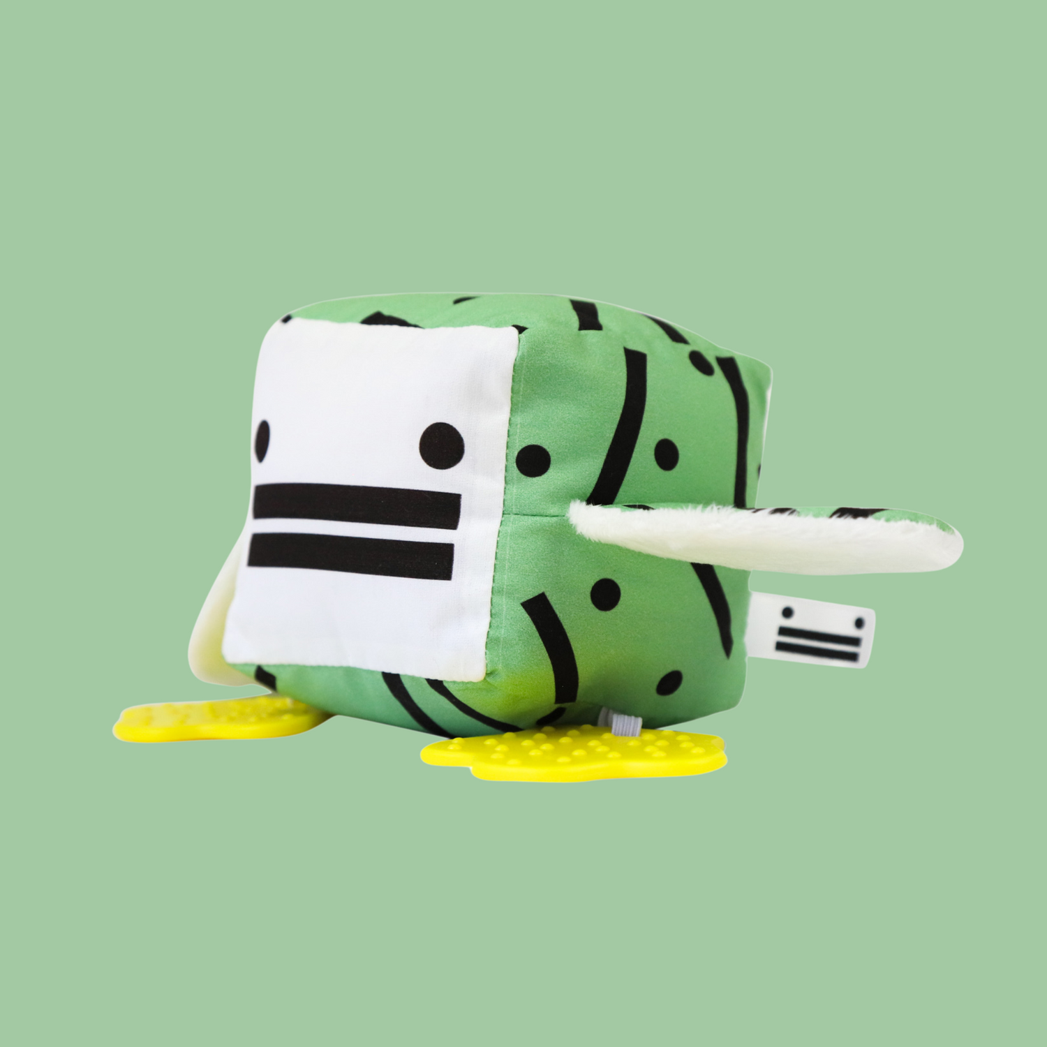 Eco-friendly and Australian-made handmade baby sensory toy — green patterned duck with soft fabric wings and safe chewable teething feet. Montessori-inspired toy for babies to encourage sensory development, teething relief, and independent play. Perfect unique baby shower gift for new parents.