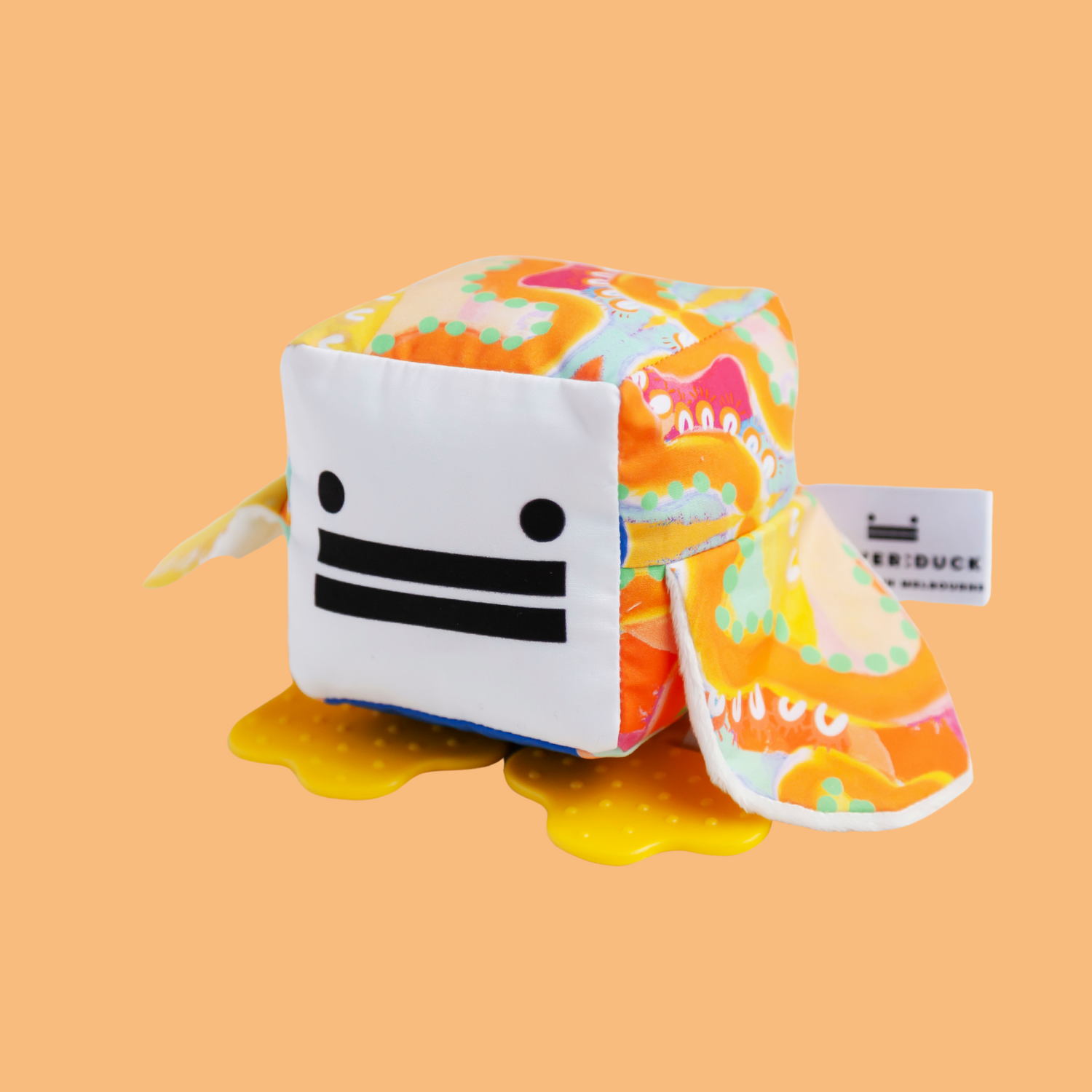 Eco-friendly and Australian-made handmade baby sensory toy — bright indigenous patterned duck with soft fabric wings and safe chewable teething feet. Montessori-inspired toy for babies to encourage sensory development, teething relief, and independent play. Perfect unique baby shower gift for new parents.