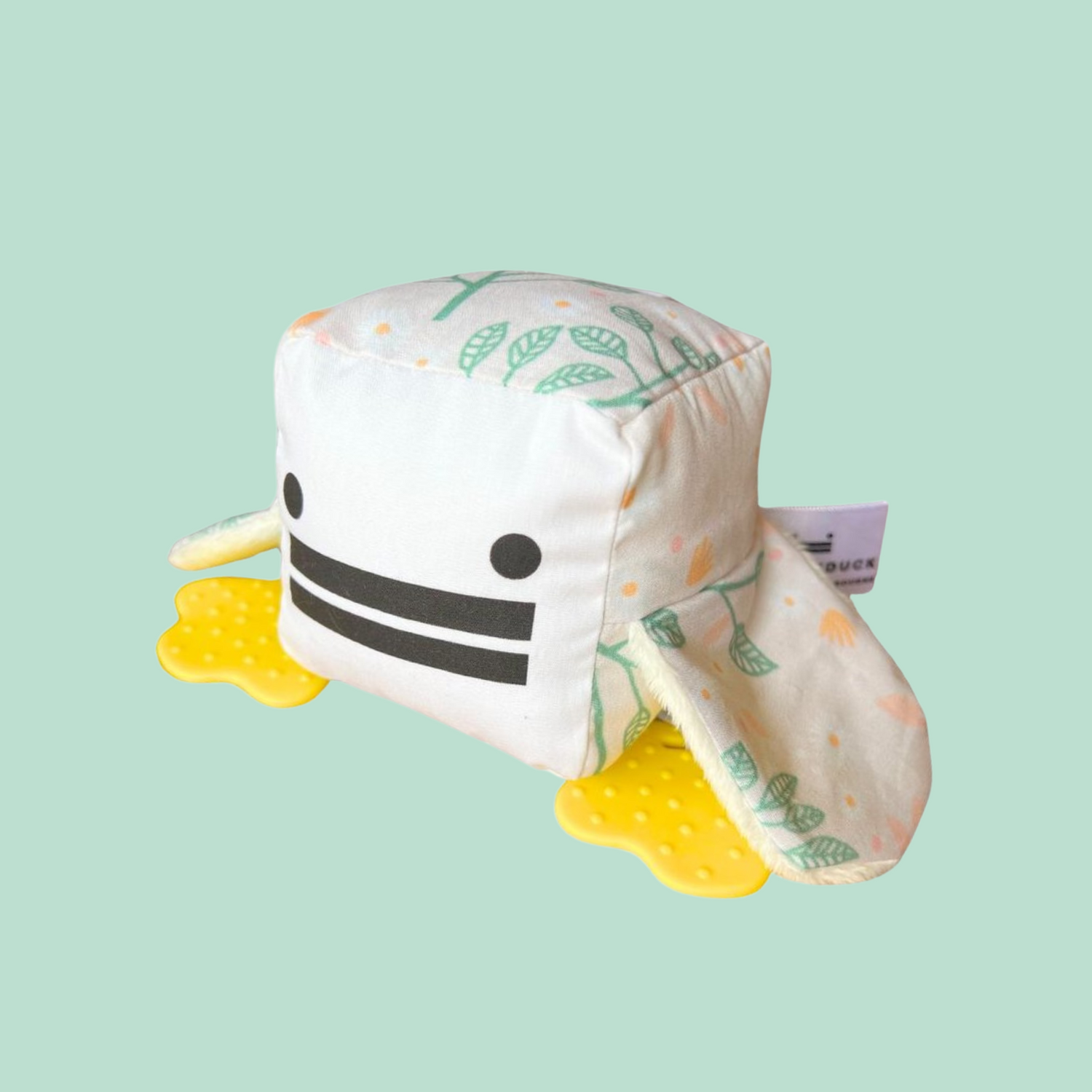 Eco-friendly and Australian-made handmade baby sensory toy — soft flower pattern duck with soft fabric wings and safe chewable teething feet. Montessori-inspired toy for babies to encourage sensory development, teething relief, and independent play. Perfect unique baby shower gift for new parents.