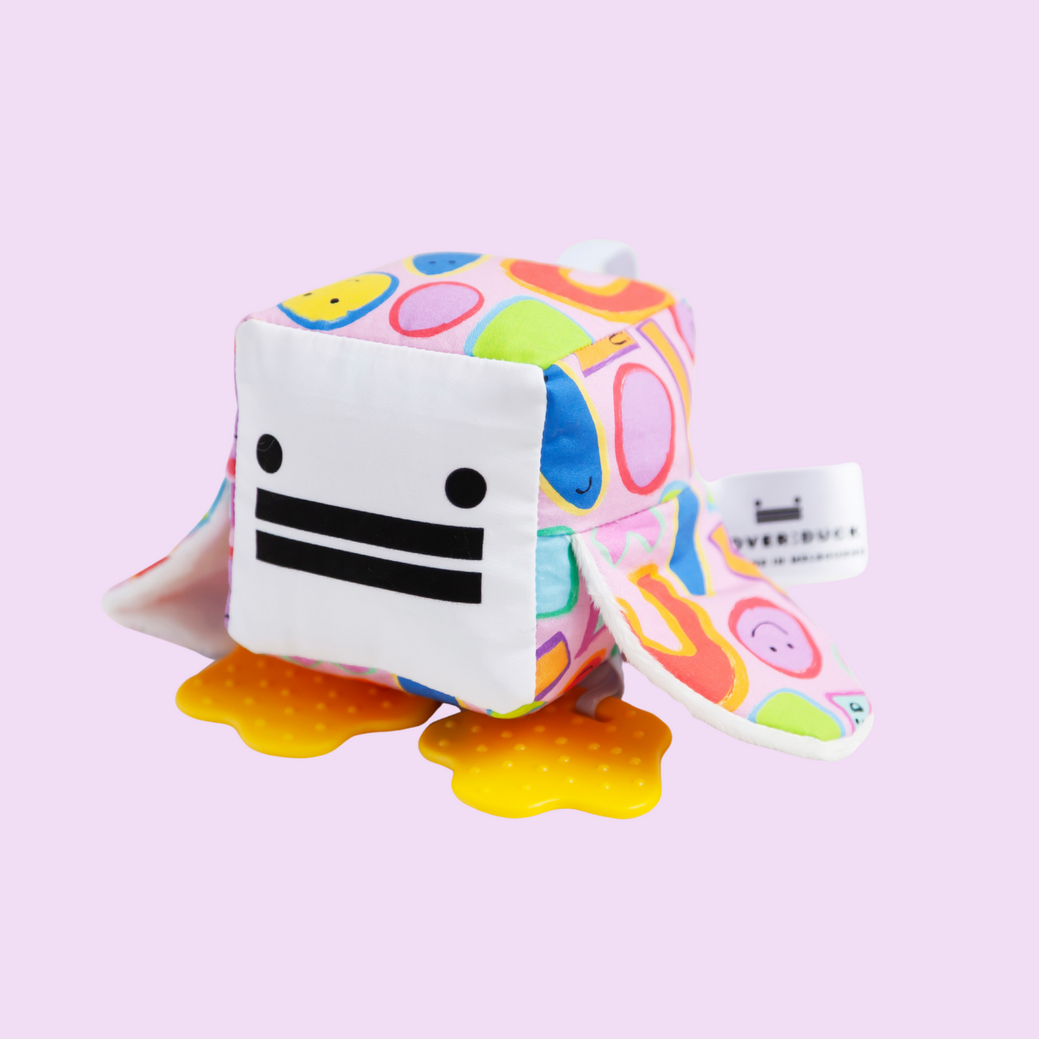 Eco-friendly, Australian-made handmade baby sensory toy — fun, smiling face patterned duck with soft fabric wings and safe chewable teething feet. Montessori-inspired toy for babies to encourage sensory development, teething relief, and independent play. Perfect unique baby shower gift for new parents.
