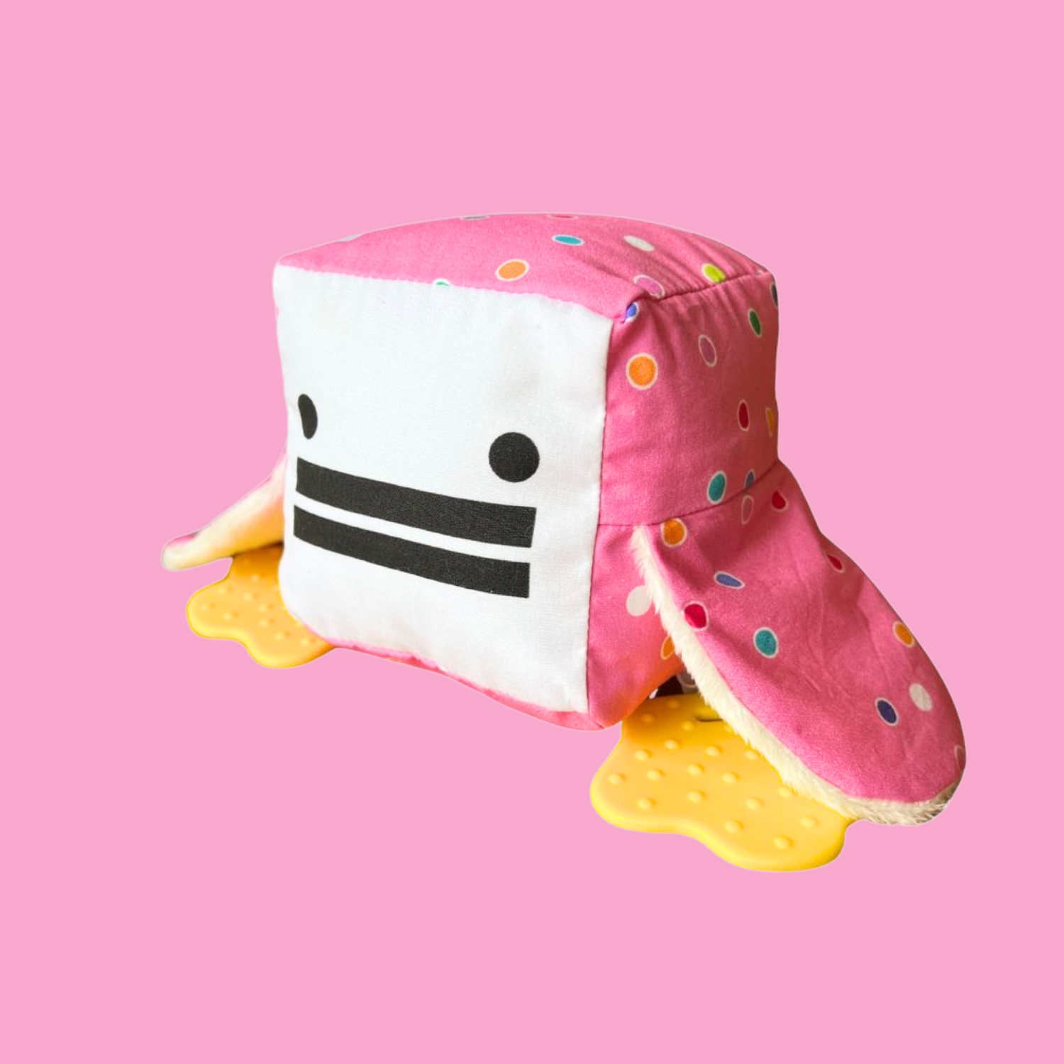 Eco-friendly and Australian-made handmade baby sensory toy — pink polka dot duck with soft fabric wings and safe chewable teething feet. Montessori-inspired toy for babies to encourage sensory development, teething relief, and independent play. Perfect unique baby shower gift for new parents.