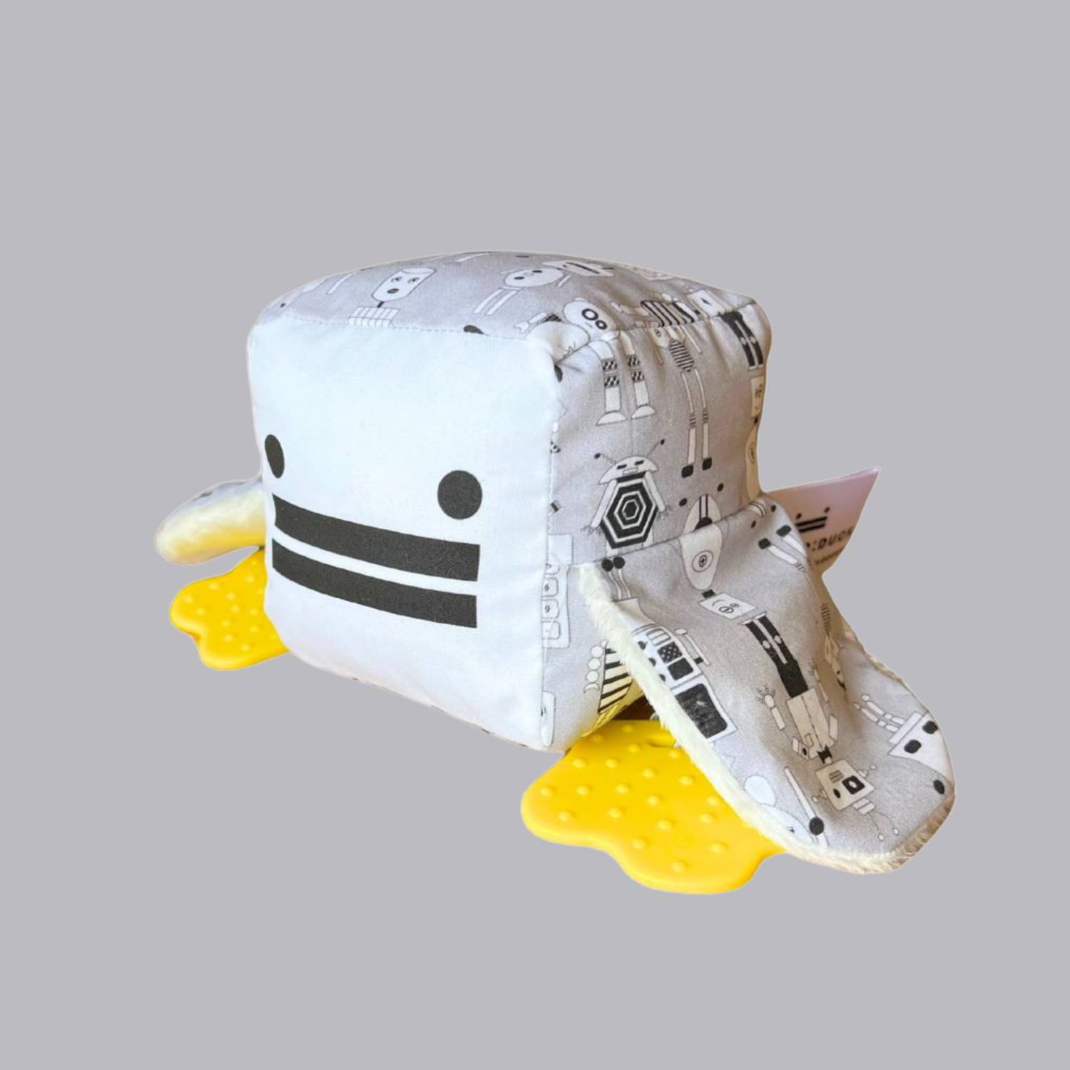 Eco-friendly and Australian-made handmade baby sensory toy — robot patterned duck with soft fabric wings and safe chewable teething feet. Montessori-inspired toy for babies to encourage sensory development, teething relief, and independent play. Perfect unique baby shower gift for new parents.